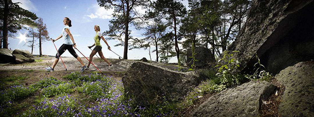 Two ladies Nordic Walking