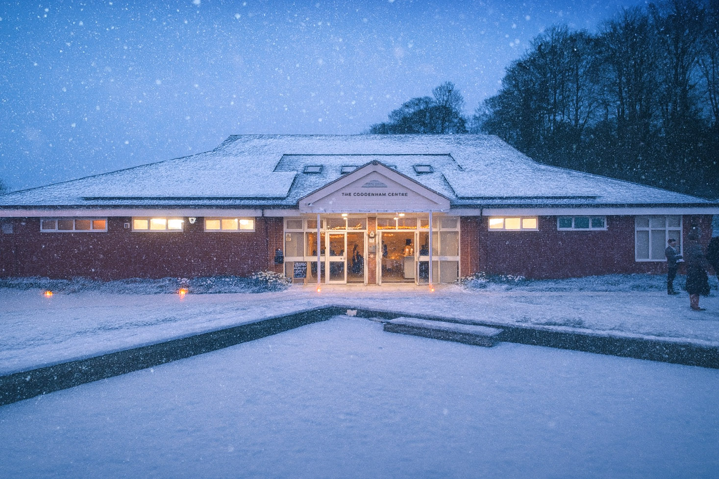 A snow covered Coddenham Centre in a dusk