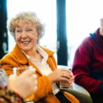 group of older people chatting happily